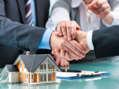 Handshakes with customer after contract signature